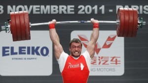 Dmitry Klokov of Russia competes in the men's 105kg weightlifting competition during the World Weightlifting Championships at Disney Village in Marne-la-Vallee outside Paris